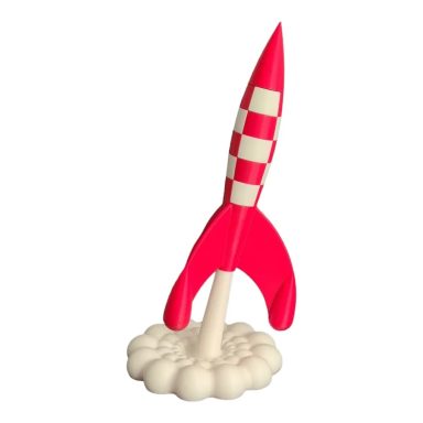 Fusée rouge et blanche décollant d'un nuage de fumée.