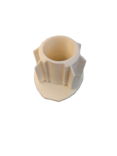 Pièce cylindrique beige avec des nervures, utilisée probablement pour l'assemblage.